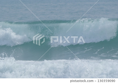 The waves crashing on Shonan break apart as they roll in 130359090