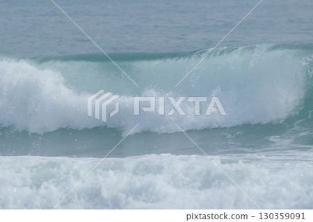 The waves crashing on Shonan break apart as they roll in The waves crashing on Shonan break apart as they roll in 130359091