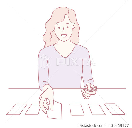 A Woman Engaged in the Art of Card Reading Using Beautiful Tarot Cards for Guidance 130359177