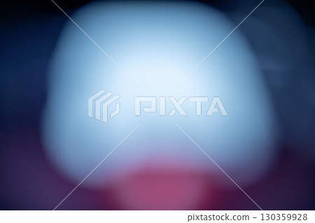 Abstract blurred background with a soft color gradient in shades of blue, white, and red. Texture or background in various designs 130359928