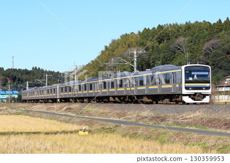 A local train on the Sobu Main Line running on a single-track local line 130359953
