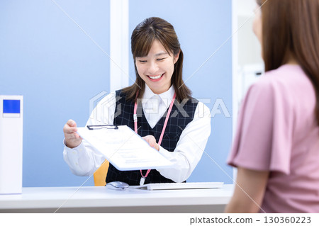 Medical reception staff in uniform Medical reception staff in uniform 130360223