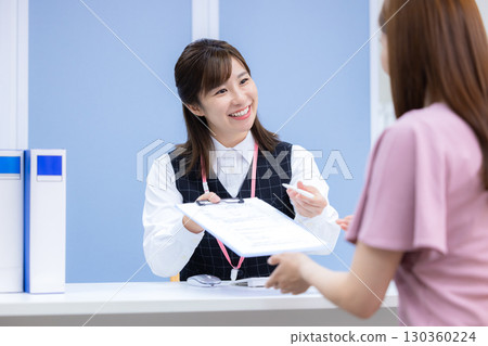 Medical reception staff in uniform 130360224