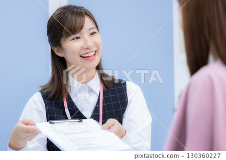 Medical reception staff in uniform 130360227