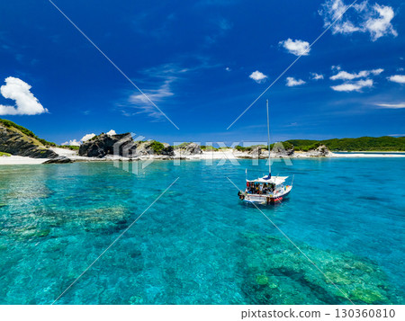 Drone footage of Kabi Island. Catamaran yachts, Zamami Island, and Agena Shiki Island. Zamami Island, Kerama Islands, Shimajiri District, Okinawa Prefecture 130360810