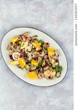 Appetizing salad with seafood. Appetizing salad with seafood. 130361057