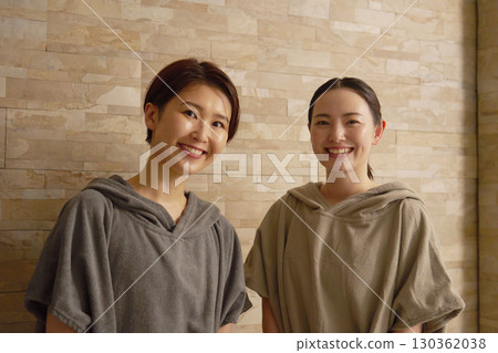 Two women using the sauna 130362038