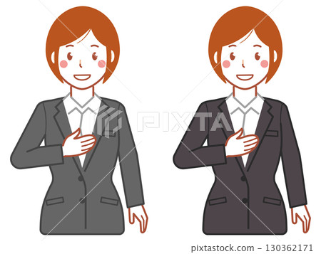 A young woman in a gray suit with short hair holding her hand on her chest 130362171