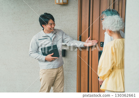 Housing salesman and senior couple 130362661