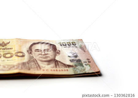 Stack of one thousand Thai baht banknotes Stack of one thousand Thai baht banknotes 130362816
