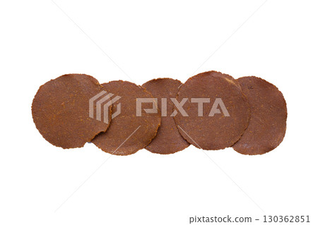 Fermented soybean discs, known as Thua Nao a traditional Thai seasoning used to enhance flavor in Northern cuisine. Fermented soybean discs, known as Thua Nao a traditional Thai seasoning used to enhance flavor in Northern cuisine. 130362851