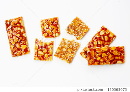 Peanut bars with sweet caramel 130363073