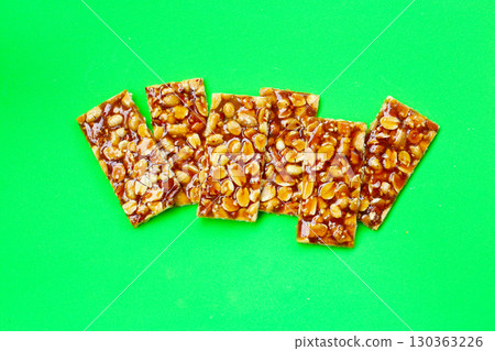 Peanut bars with sweet caramel Peanut bars with sweet caramel 130363226