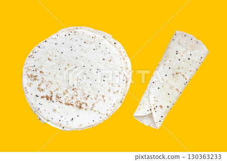 Quinoa tortilla wraps on yellow background 130363233