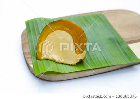 Egg custard steamed in pumpkin Egg custard steamed in pumpkin 130363376