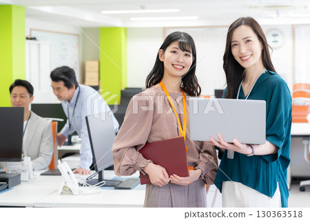 Male and female engineers working in the office Male and female engineers working in the office 130363518