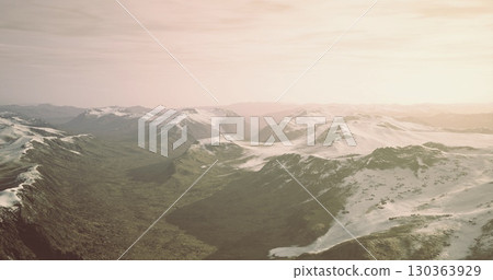 Waves of majestic mountains stretch endlessly, their snow capped summits glowing in the soft light of dawn. Valleys below cradle lush green terrain, showcasing natures serene beauty. Waves of majestic mountains stretch endlessly, their snow capped summits glowing in the soft light of dawn. Valleys below cradle lush green terrain, showcasing natures serene beauty. 130363929