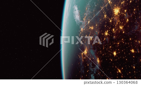 The Earth, as seen from space during nighttime, is illuminated by city lights and natural phenomena creating a stunning array of glowing patterns. 130364068