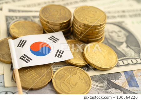 South Korea flag on coin and banknote money, finance trading investment business currency. 130364226