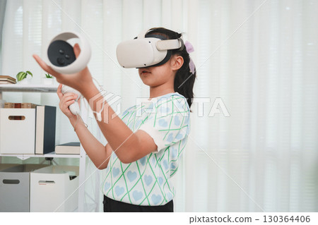 Girl Learning with Virtual Reality Headset Future Education Technology 130364406