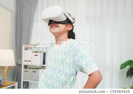 Girl Enjoying Virtual Reality Experience for Learning and Fun 130364420