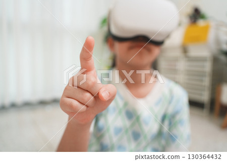 Child Student Pointing in Virtual Reality Learning and Fun 130364432