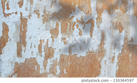 Old grunge and crack yellow wall and shadows. Background with copy space Old grunge and crack yellow wall and shadows. Background with copy space 130364597