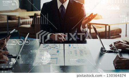 Group of business people meeting in office with statistical data concept Group of business people meeting in office with statistical data concept 130364874