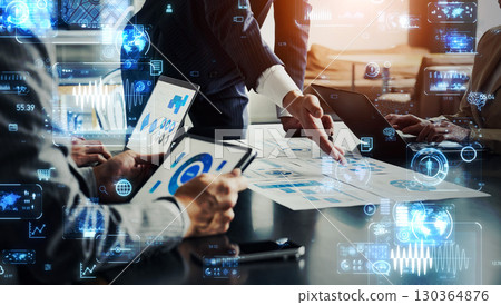 Group of business people meeting in office with digital technology concept Group of business people meeting in office with digital technology concept 130364876