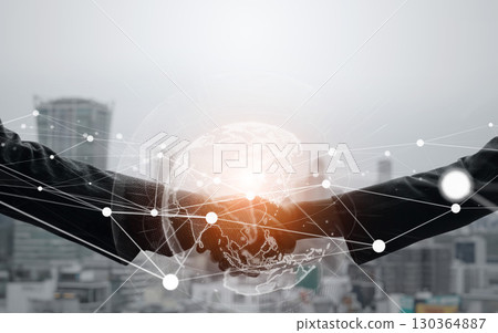 Business people shaking hands and global network concept Business people shaking hands and global network concept 130364887