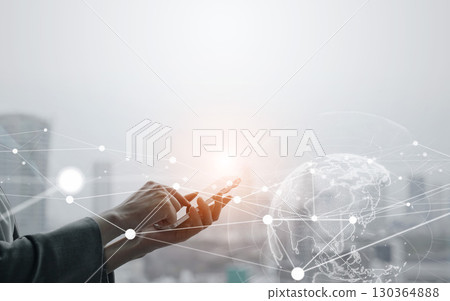 Woman using smartphone and global network concept Woman using smartphone and global network concept 130364888