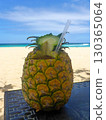 Ananas drink at the beach of the Atlantic ocean in Dominican Republic, Caribbean. 130365064