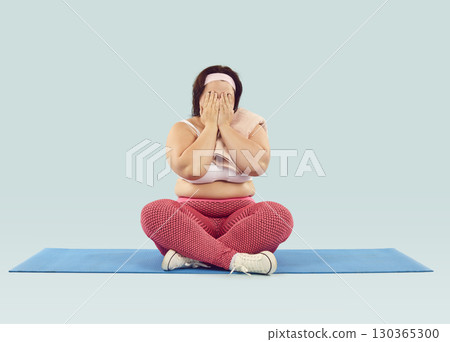 Overweight woman wants to lose weight but gets tired and desperate and starts crying Overweight woman wants to lose weight but gets tired and desperate and starts crying 130365300