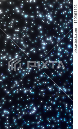 Abstract glowing blue particles floating in a dark background resembling stars or digital sparks 130365391