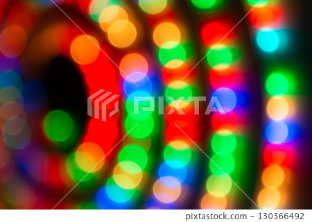 Abstract colorful lights in spiral circle 130366492