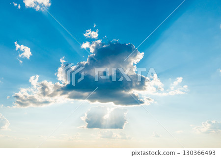 Sun light through cloud on blue sky 130366493