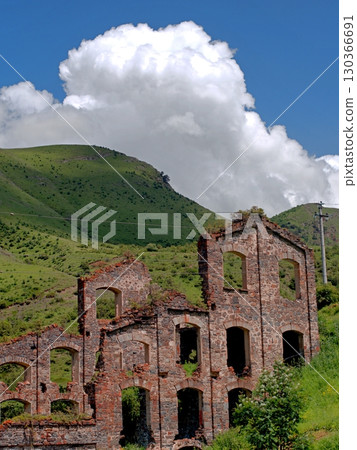 Ruins of a processing plant built by the Belgians in the 19th century in the village of Fasnal, North Ossetia, Russia. Ruins of a processing plant built by the Belgians in the 19th century in the village of Fasnal, North Ossetia, Russia. 130366691