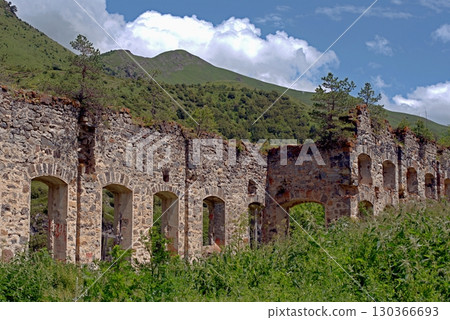 Ruins of a processing plant built by the Belgians in the 19th century in the village of Fasnal, North Ossetia, Russia. Ruins of a processing plant built by the Belgians in the 19th century in the village of Fasnal, North Ossetia, Russia. 130366693