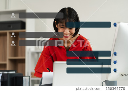Businesswoman uses artificial intelligence chatbots automatically respond online messages to help customers instantly. Businesswoman uses artificial intelligence chatbots automatically respond online messages to help customers instantly. 130366778
