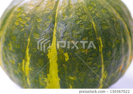 Green pumpkin on the white background 130367022