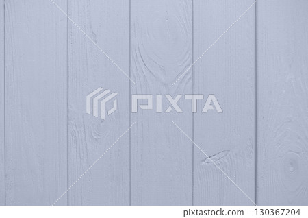 Light blue painted wooden boards creating a textured, rustic background, ideal for design projects and adding a touch of vintage charm 130367204