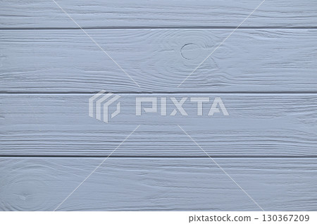 Light blue painted wooden boards creating a textured, rustic background, ideal for design projects and adding charm of vintage touch 130367209
