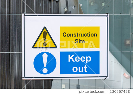 Construction Site Safety Sign on Modern Building Fence. Keep Out Warning Notice 130367438