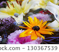Yellow flowers floating on the water 130367539