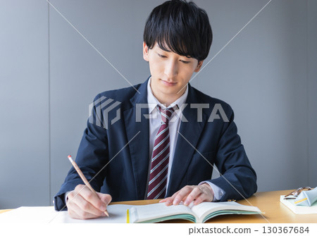 Male high school student studying 130367684