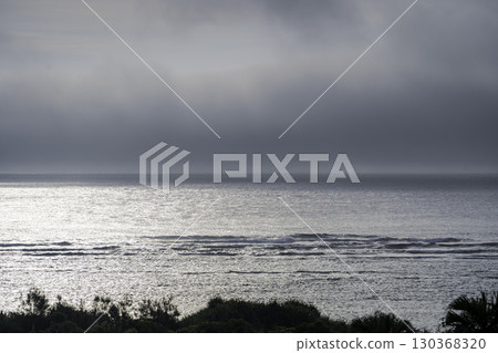 Light shining into the sea 130368320