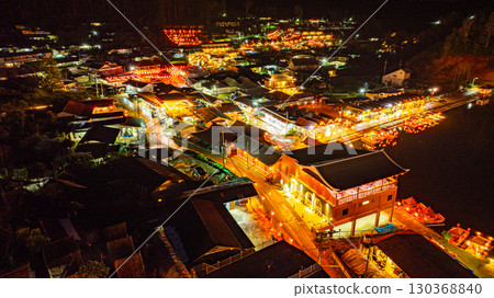 Illuminated Chinese Mountain Village at Night 130368840