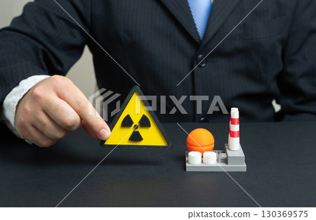 Radiation hazard at an industrial enterprise. Nuclear energy, nuclear industry. Safety risks, radioactive waste, environmental danger, power plants, industrial security, crisis prevention 130369575