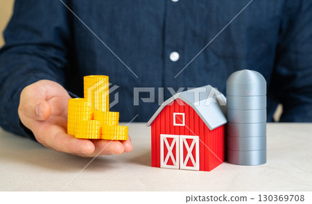 The man receives a financial subsidy. Agriculture support, state aid, rural development, farm sustainability, food security funding 130369708