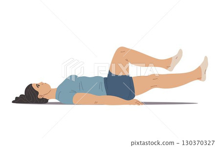 Woman doing bicycle crunch exercise on floor Woman doing bicycle crunch exercise on floor 130370327